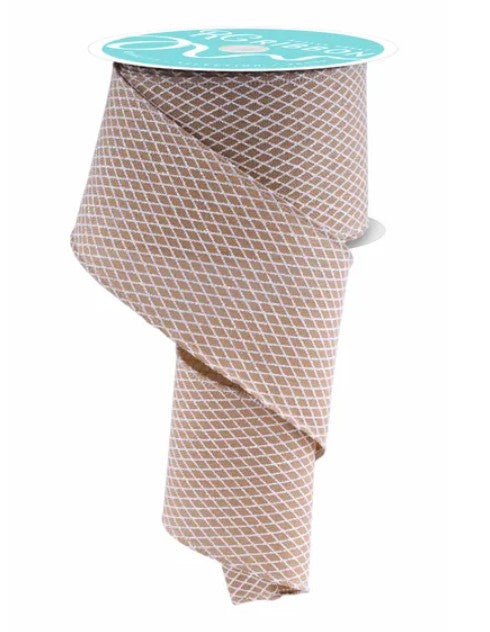 A roll of brown and white patterned ribbon with a turquoise label.