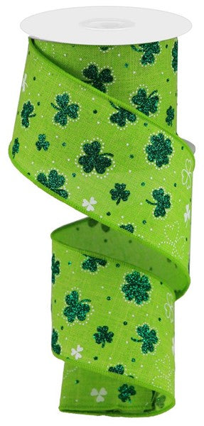 a green ribbon with shamrocks on it