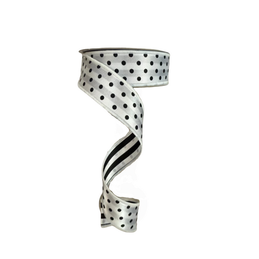 a white and black ribbon with polka dots on it
