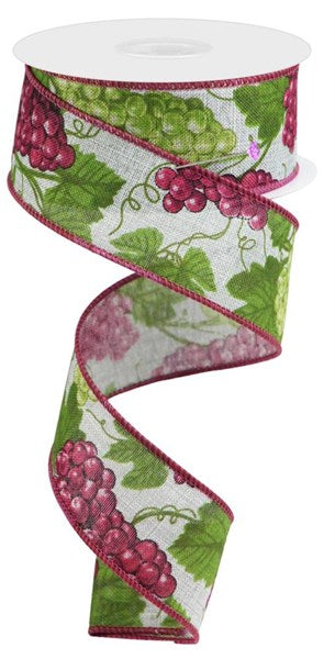 a ribbon with grapes and leaves on it