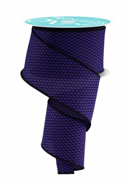 a purple and black patterned fabric, which appears to be a decorative piece.