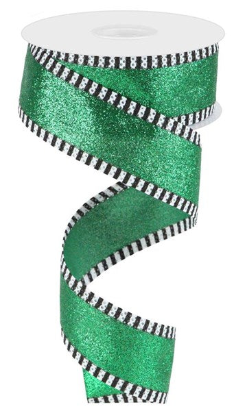 a roll of green glitter ribbon with black and white stripes