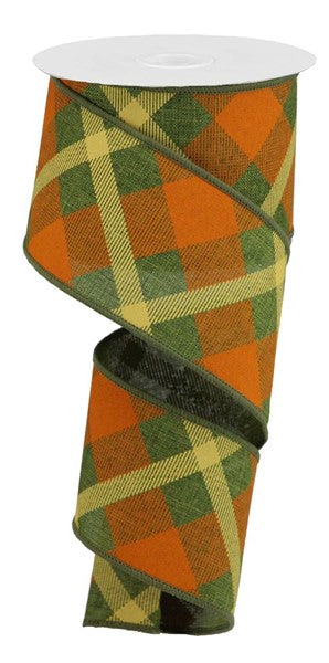 a roll of orange and green plaid ribbon