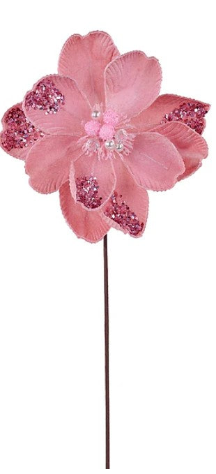A pink flower with glitter accents on its petals.