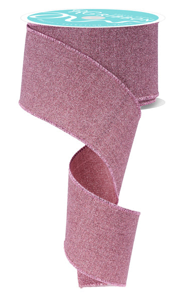 a roll of pink glitter ribbon on a white background