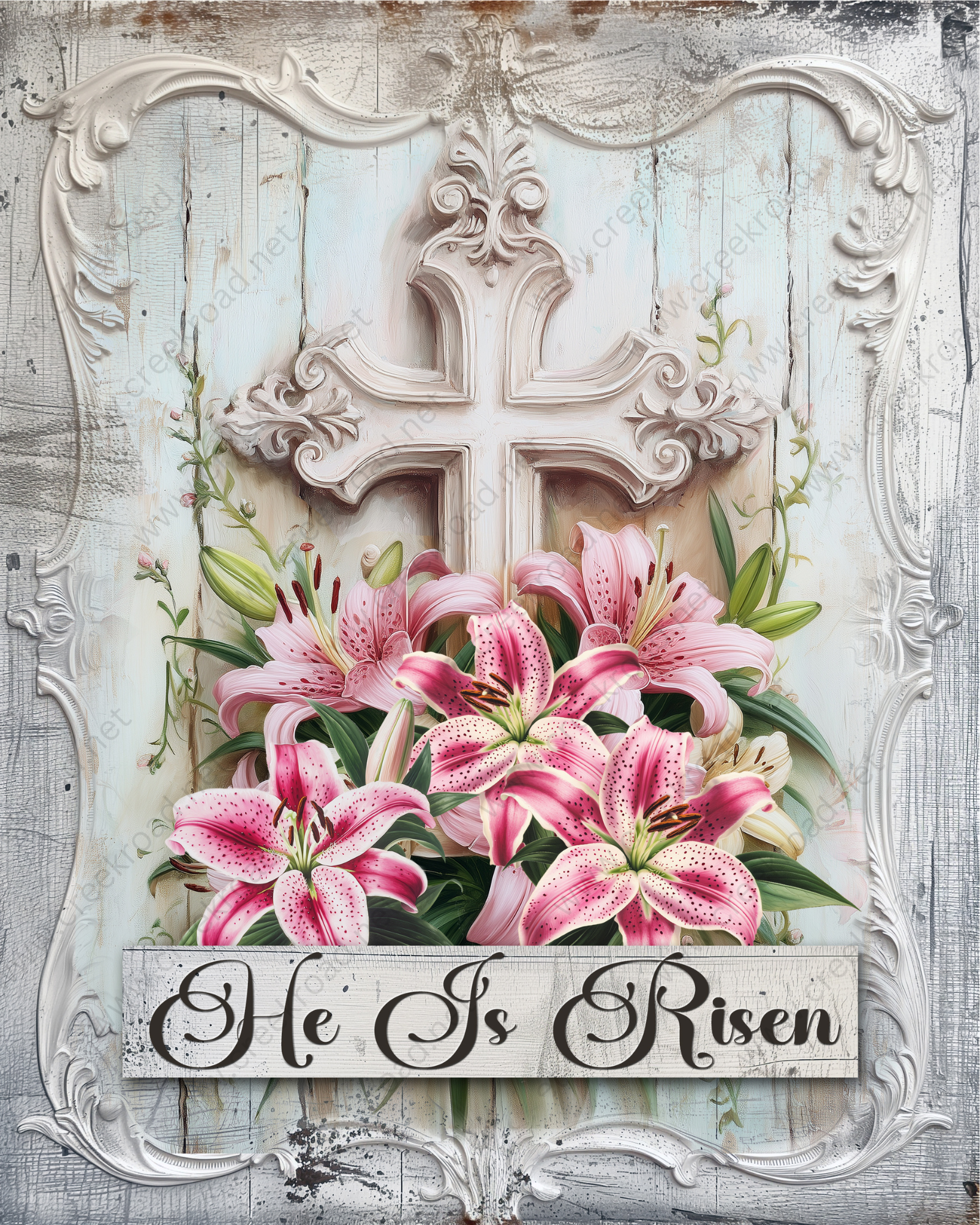 A floral arrangement with pink lilies and a white cross against a wooden background, accompanied by the text "He Is Risen" in a decorative frame.