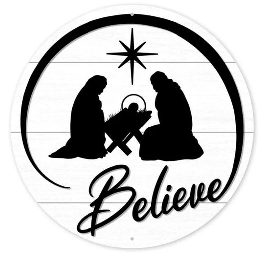 a nativity scene with a man, a woman, and a baby in a manger, along with a star above them. The word "Believe" is written below the nativity scene.