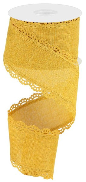 A yellow fabric ribbon with a scalloped edge and a decorative lace-like pattern.