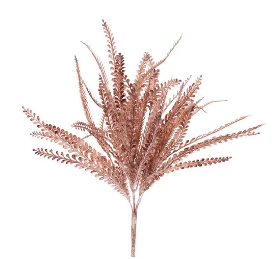 A cluster of brown, feathery leaves or branches with a textured appearance, resembling a plant or a decorative element.