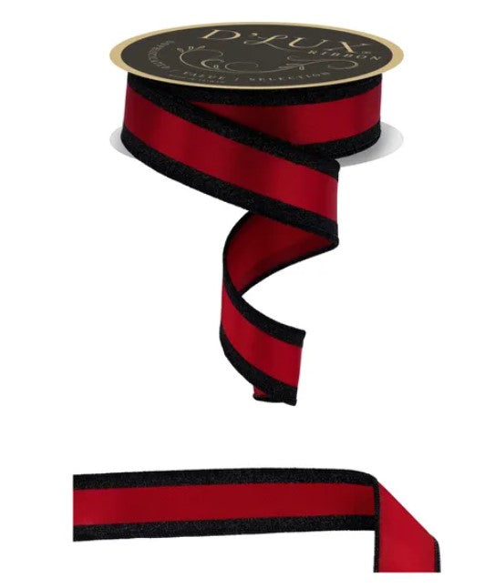 a red and black striped ribbon with a gold label.