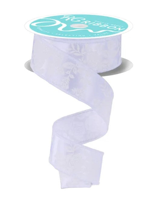 A roll of white ribbon with a teal label that says "Ribbon" on it.