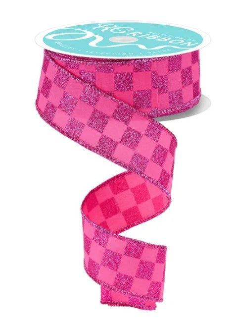 A pink and black checkered ribbon with a turquoise label.