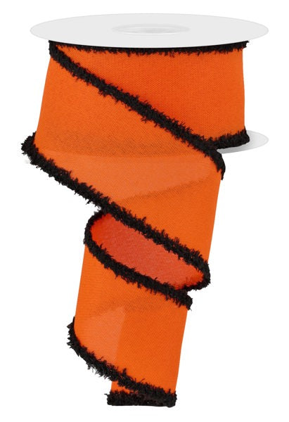 a bright orange ribbon with black fringe, which is coiled and attached to a white spool.
