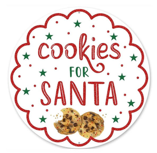 a round sign with the text "cookies for santa" written in a decorative font, surrounded by green stars and red dots.
