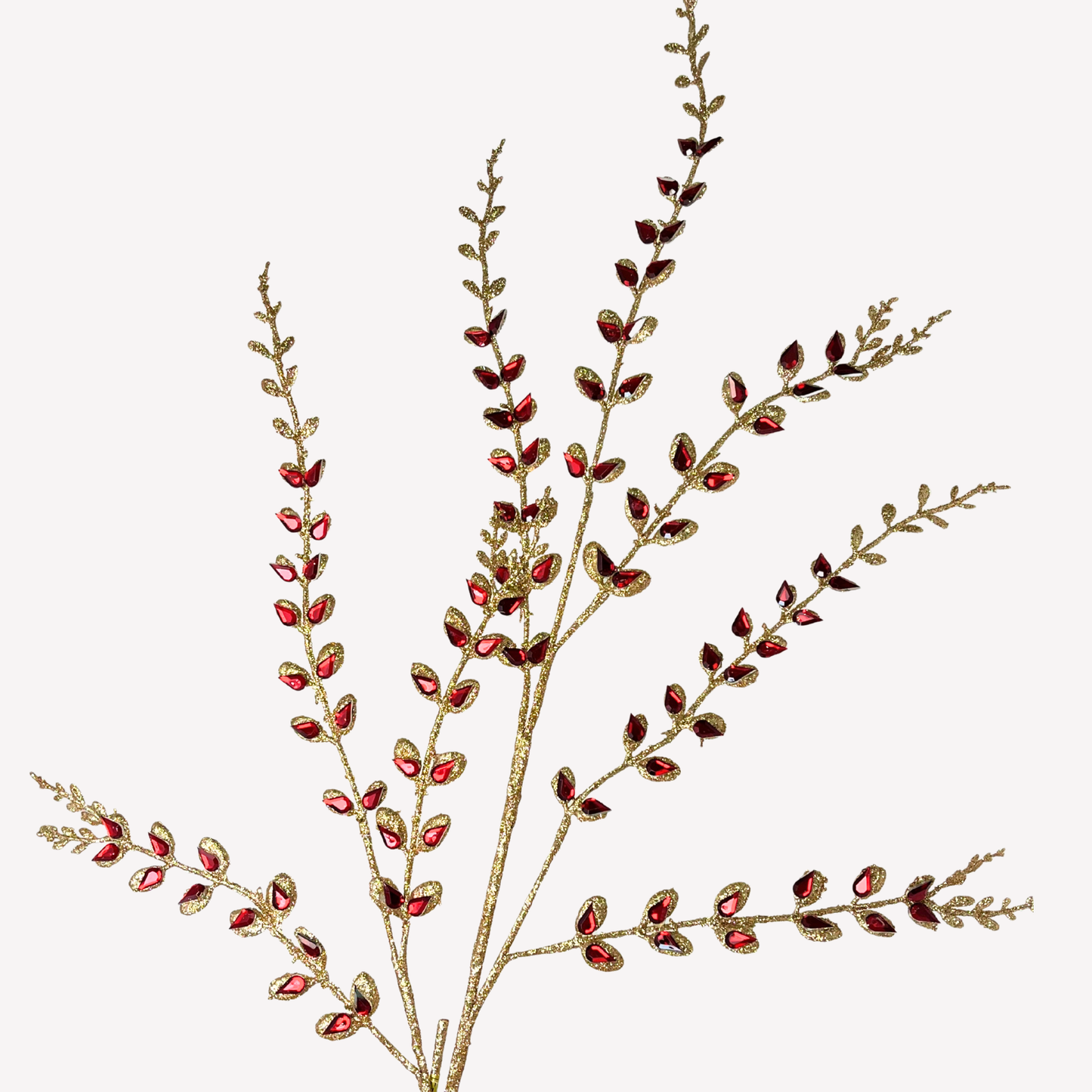 a branch with red and gold leaves, possibly resembling a plant or a decorative element.