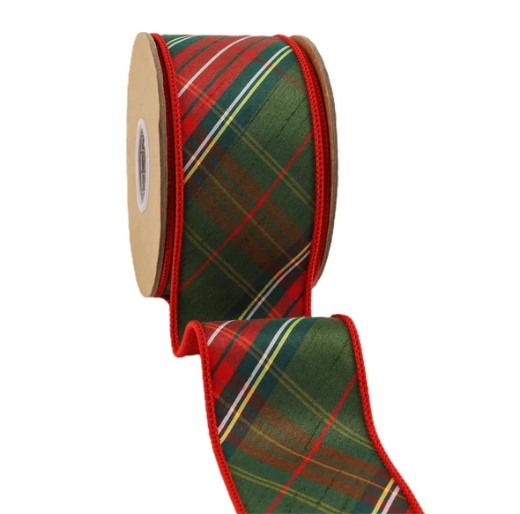 A roll of red and green plaid ribbon with a white label on the side.
