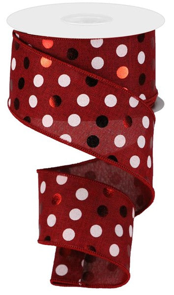 a roll of red and white polka dot ribbon