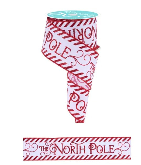 A red and white striped Christmas ribbon with the text "The North Pole" printed on it.