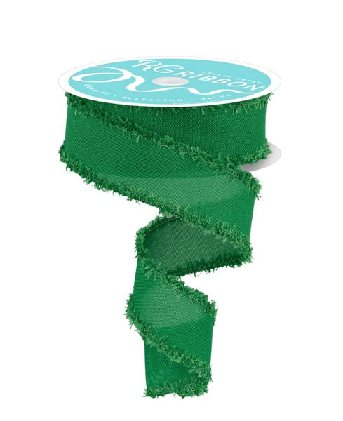 a roll of green ribbon on a white background