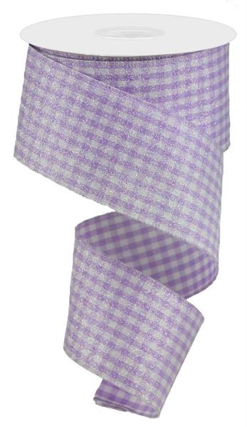 a roll of purple and white checkered ribbon