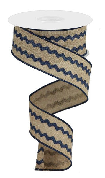 a roll of blue and beige ribbon on a white background