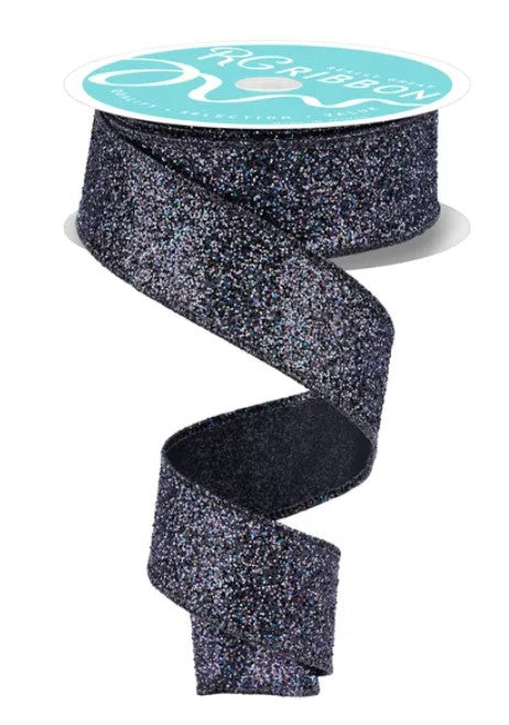 A roll of black glittery ribbon with a turquoise label.