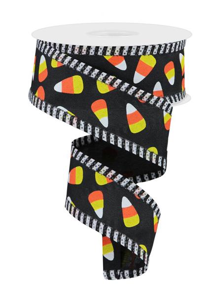 a roll of halloween candy tape on a white background