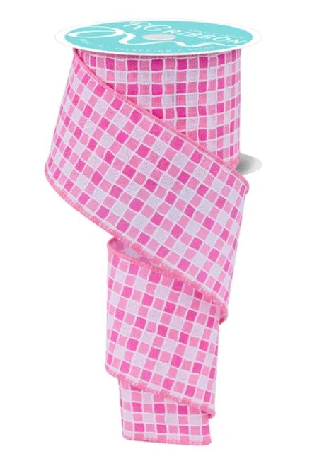 A pink and white checkered pattern ribbon is shown, with a turquoise label on top.