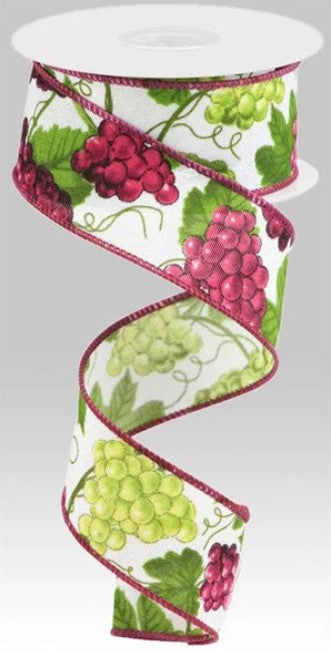 a ribbon with grapes and leaves on it