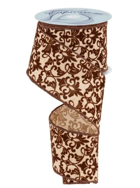 a brown and beige floral patterned ribbon.