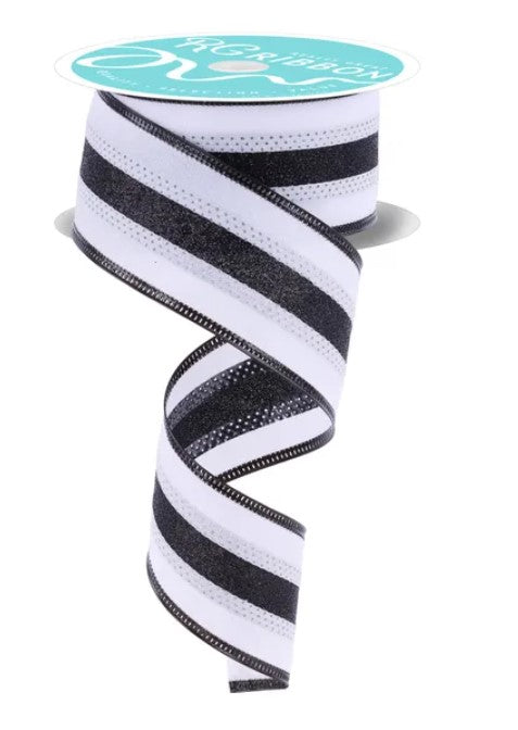 A black and white striped ribbon with a teal label.