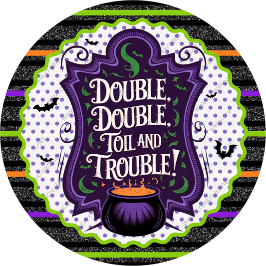 a Halloween-themed design with a pot of gold at the center, surrounded by bats and a decorative border. The text "Double, Double, Toil and Trouble!" is prominently displayed in the center of the image.