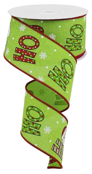 a roll of green christmas ribbon with the word noel on it