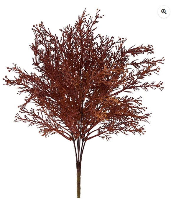 a tree with brown branches and leaves, creating a natural and serene scene.