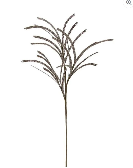 A single, stylized branch with a dark, textured appearance, resembling a plant or tree-like structure.