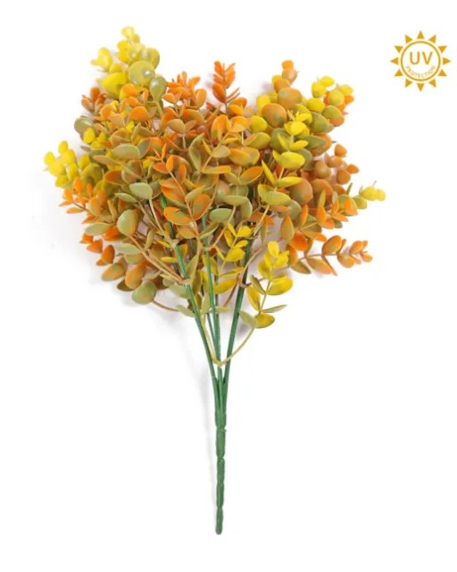 A bouquet of artificial flowers with a mix of yellow and orange leaves, arranged in a cluster.