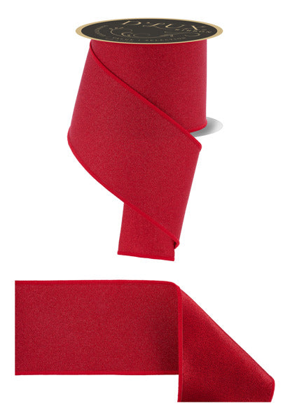 a red ribbon with a black label, and a smaller red ribbon.