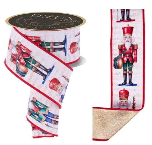 a Christmas-themed ribbon with nutcracker soldiers and other festive elements.