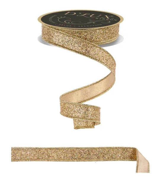 A gold glittery ribbon is shown in the image, with a black circular label on top.