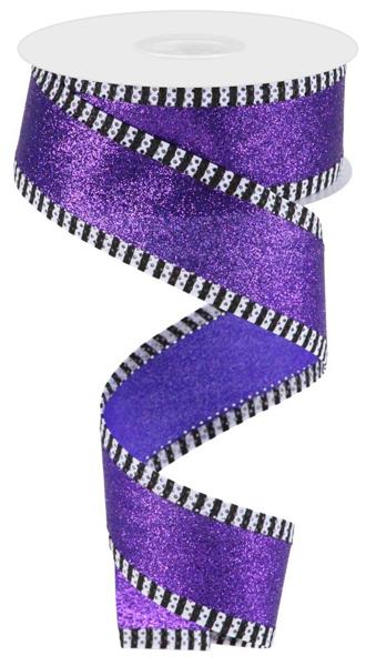 a purple ribbon with black and white stripes