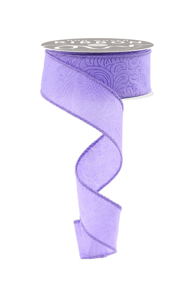 A purple ribbon with a floral pattern is shown against a white background.