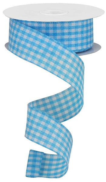 a roll of blue gingham ribbon on a white background