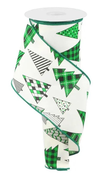 A white ribbon with a green and black plaid pattern of Christmas trees printed on it.