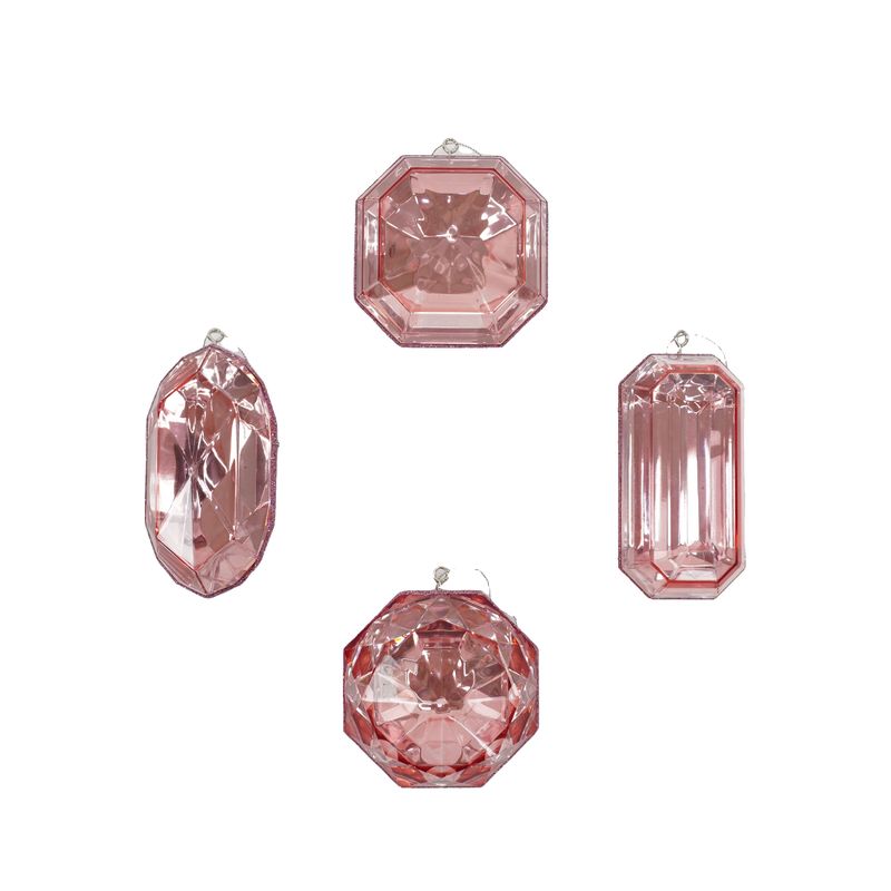 a group of three pink stones sitting next to each other