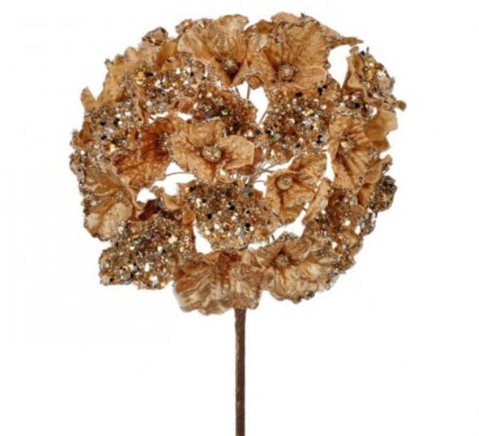 A decorative gold flower arrangement with intricate details and sparkling elements.
