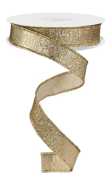 a roll of gold glitter ribbon on a white background