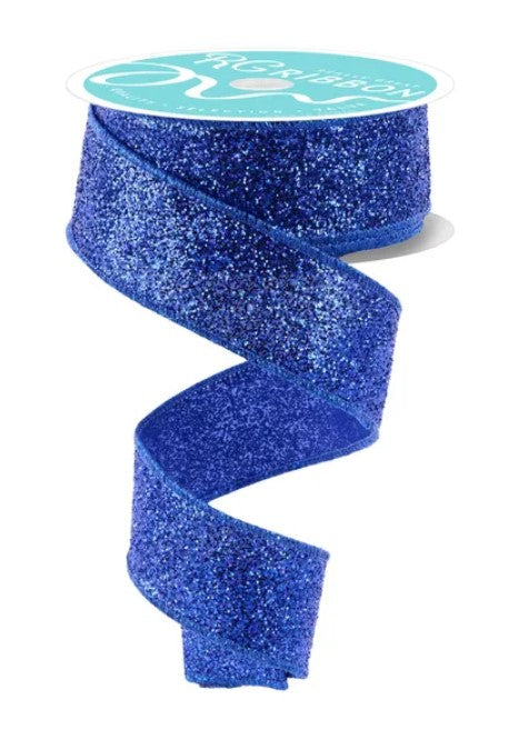 A spiral-shaped blue glitter ribbon with a white label on top.