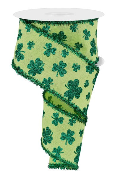 a green ribbon with shamrocks on it