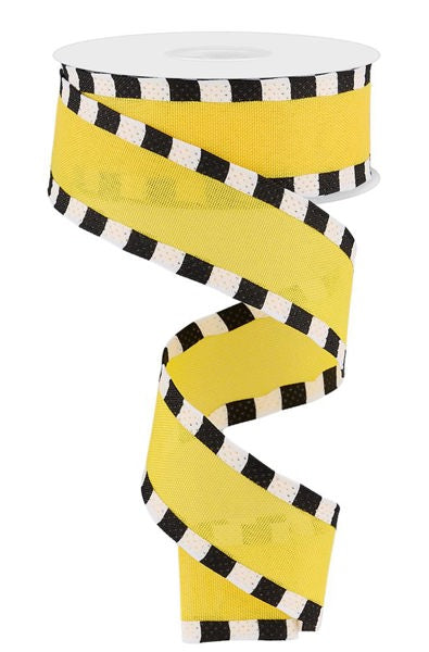 a yellow and black checkered ribbon on a white background