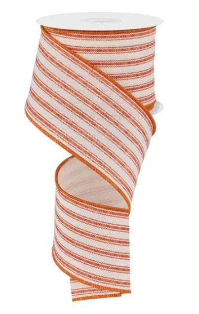 a roll of red and white striped ribbon with a white base.